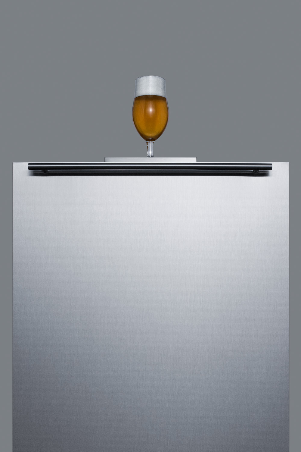 Built-in undercounter ADA height commercially listed kegerator with stainless steel wrapped door and black cabinet; no tapping equipment included